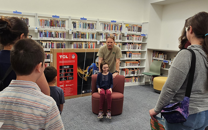 A home school group tours the remodeled library on Sept. 29. Read more about the grand re-opening in the Your City section.