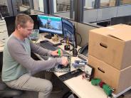 IT staff works on a computer