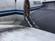 A full cargo plane is parked at the Hermiston Airport