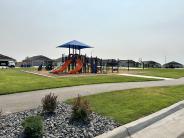 Photo of Horizon Park's playground and landscaping.