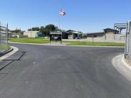 Come in the gate and turn left