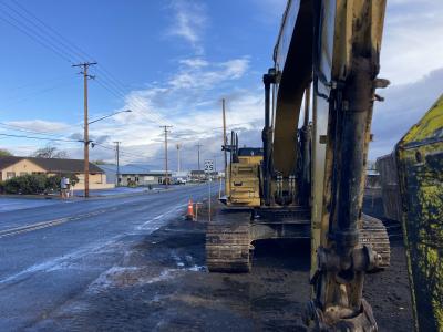 Construction equipment stands ready on S. 1st Place