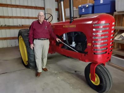 Bill Elfering and his donated Massey-Harris tractor
