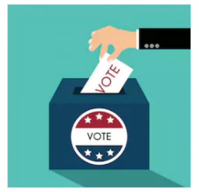 A hand placing an election ballot in a ballot box