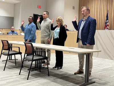 Jackie Linton, Roy Barron, Jackie Myers and David McCarthy take the oath of office at Hermiston City Hall on December 12, 2022.