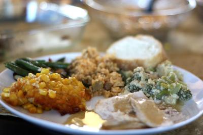 Holiday meal with turkey, stuffing and vegetables