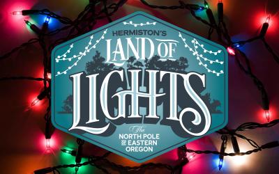 Land of lights logo and Christmas string lights