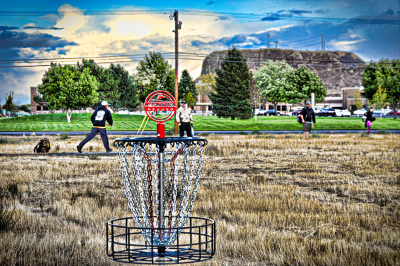 People play disc golf at the course near the Hermiston Butte.