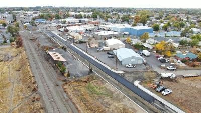 Aerial view of paving on N. 1st Place with roadway partially complete