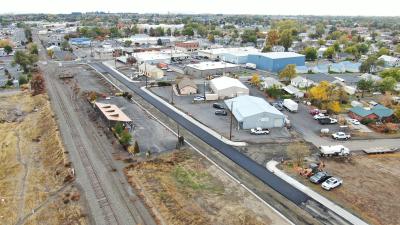 Aerial view of paving on N. 1st Place with roadway partially complete