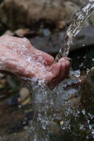 hand with water running on it